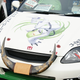 Illustration for article titled A Thousand Cars, Covered In Otaku Stickers
